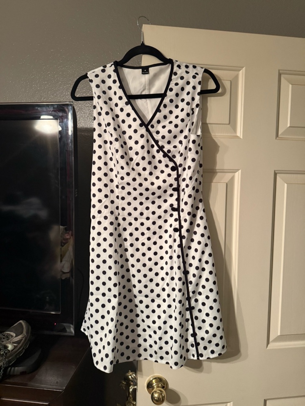 Sleeveless White and Black Polka Dot Wrap Dress